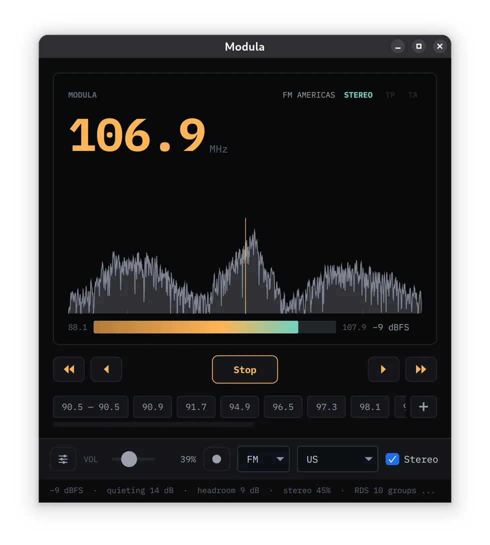 The Modula FM radio interface tuned to 106.9 MHz, with a live spectrum, presets, and stereo controls.